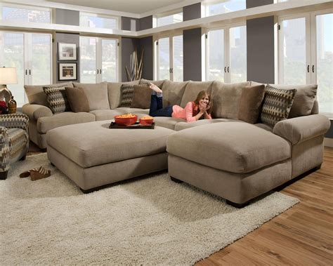 big sectional couch with ottoman.